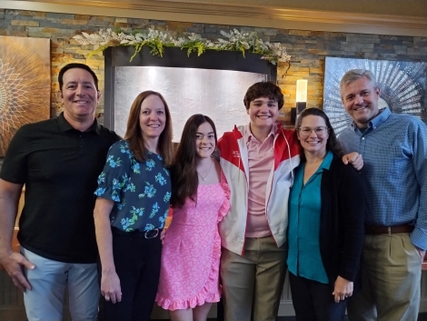 2 of the 2024 Milford High School Scholarship recipients with their parents